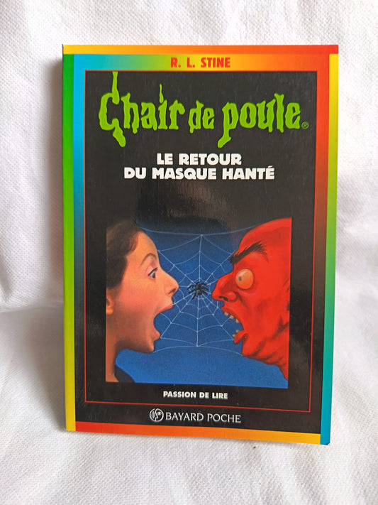 Couverture du livre Chair de Poule n°23 Le Retour du Masque Hanté, R.L. Stine